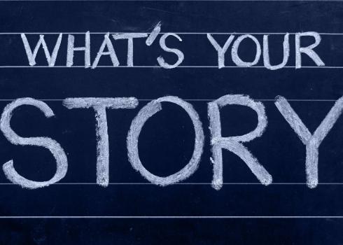 Chalkboard with 'What's Your Story?'