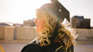 Woman wearing academic regalia